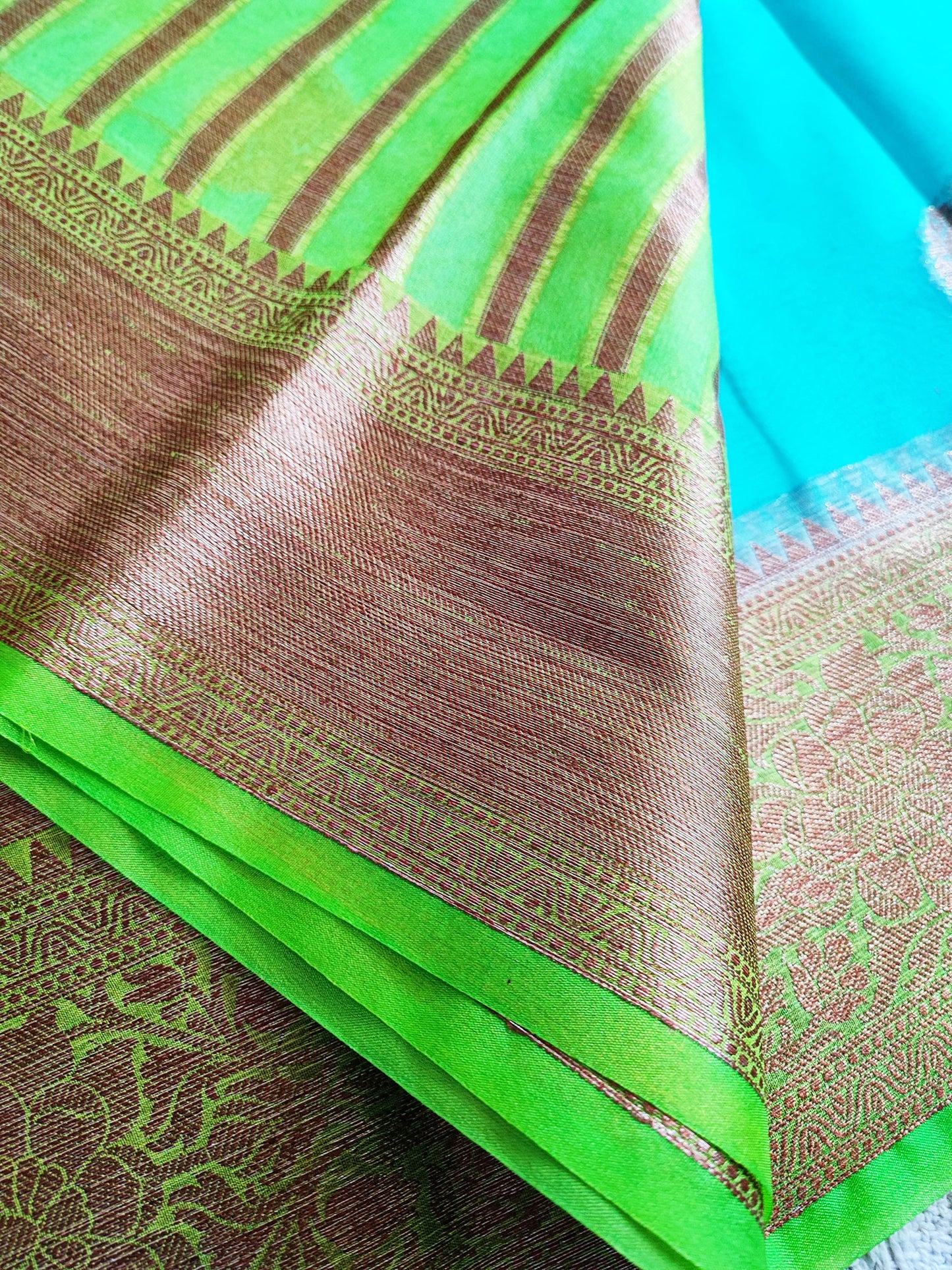 Cyan and Fern Green Semi Organza Silk Saree With Golden Rust Zari Border