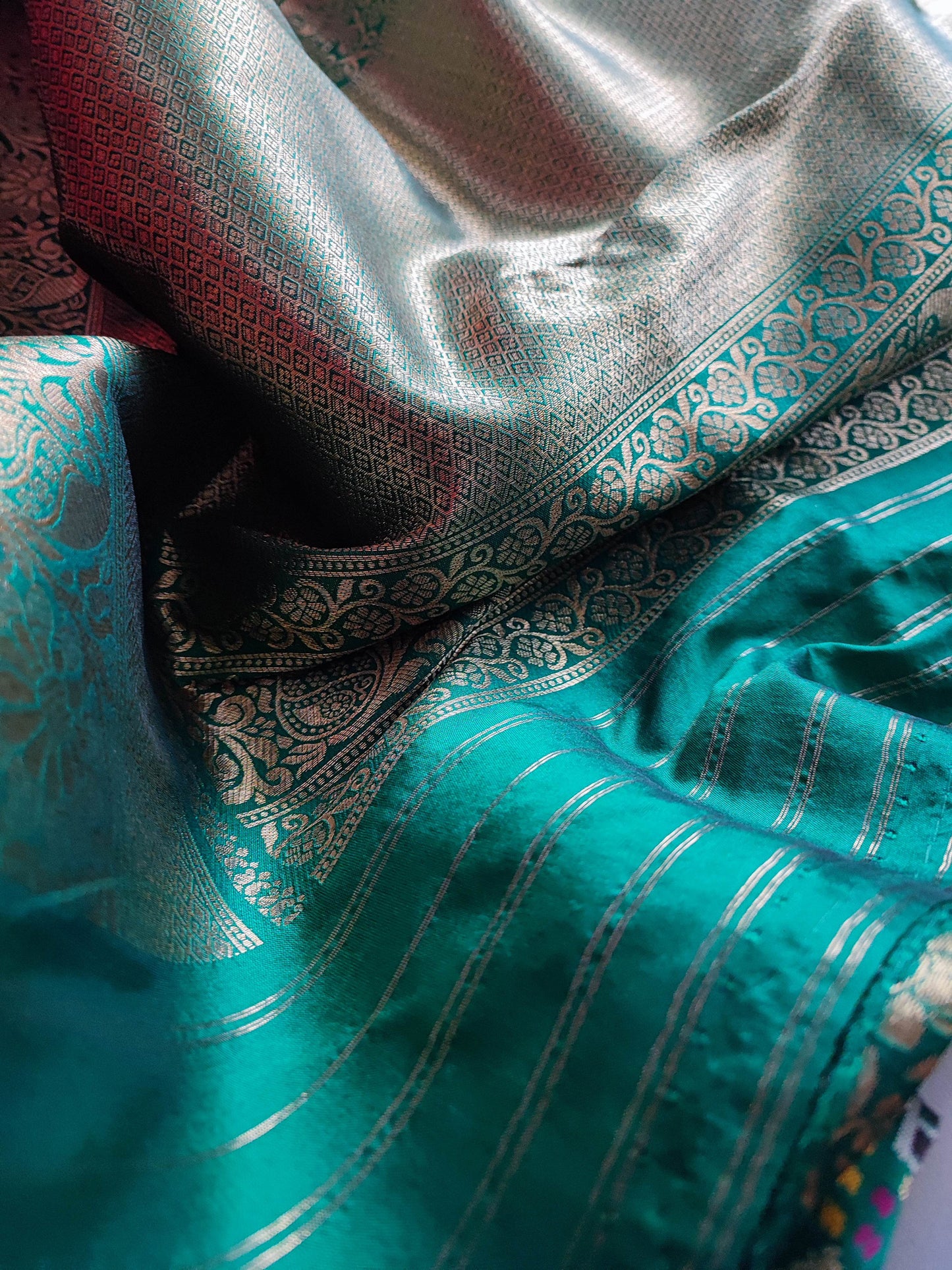 Teal Green Banarasi Silk Saree with Fine Weaving and Zari Border