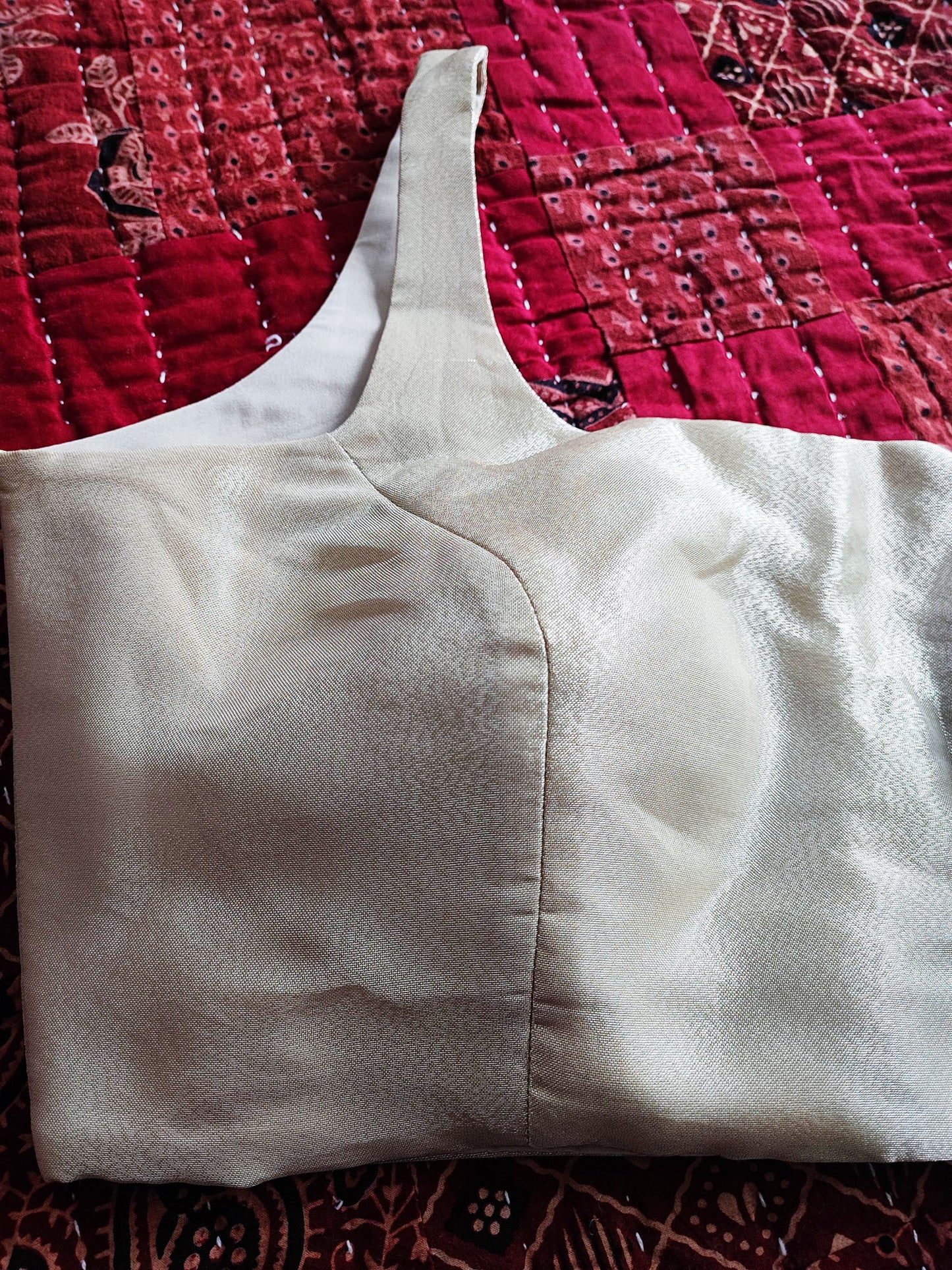 Silver White Tissue Silk Padded Sleeveless Blouse with Broad U Neckline