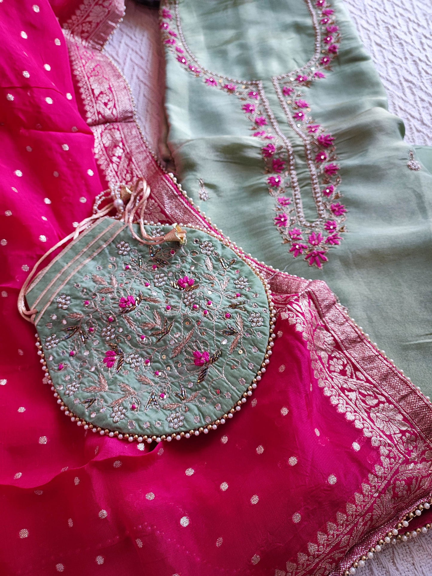 Pistachio Banarsi Dola Suit with Dabka & Zardozi handwork With Matching Potli & Hot Pink Zari Border Dupatta