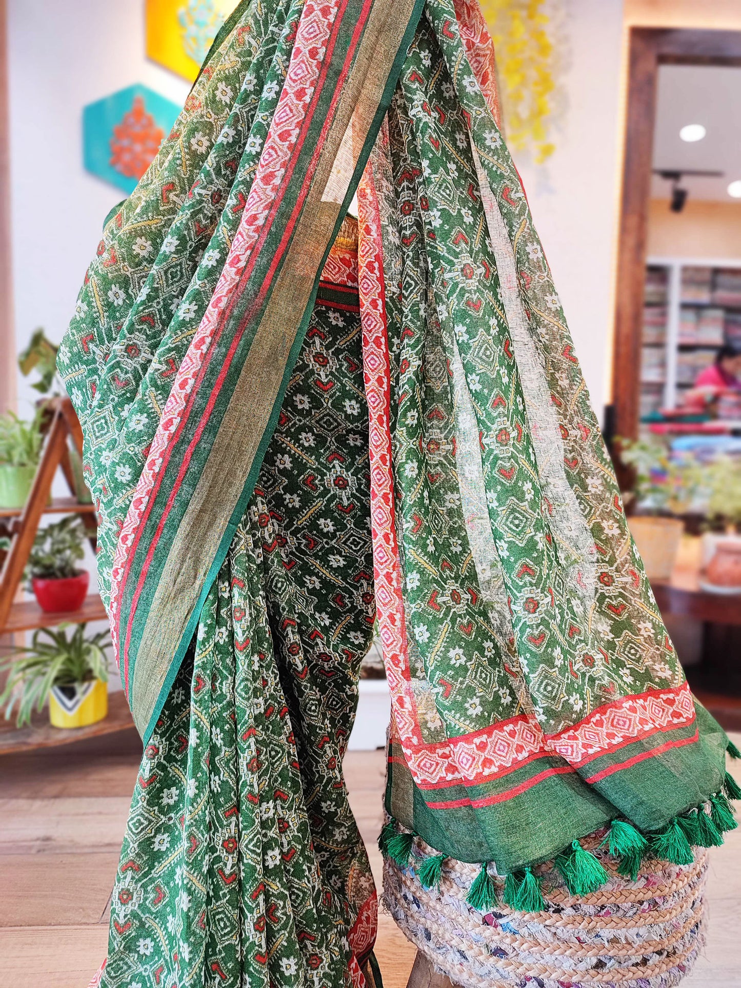 Fern Green Floral Print Linen Saree with Tassel Detailing