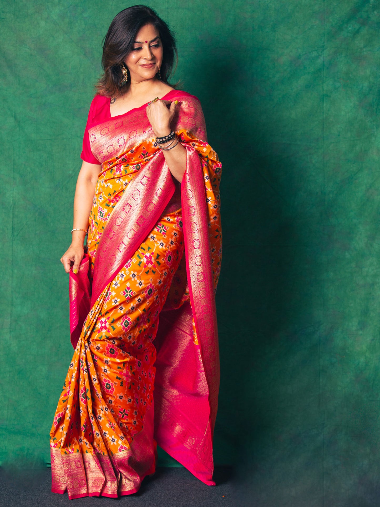 Marigold Yellow & Magenta Patola Silk Saree With Zari Border