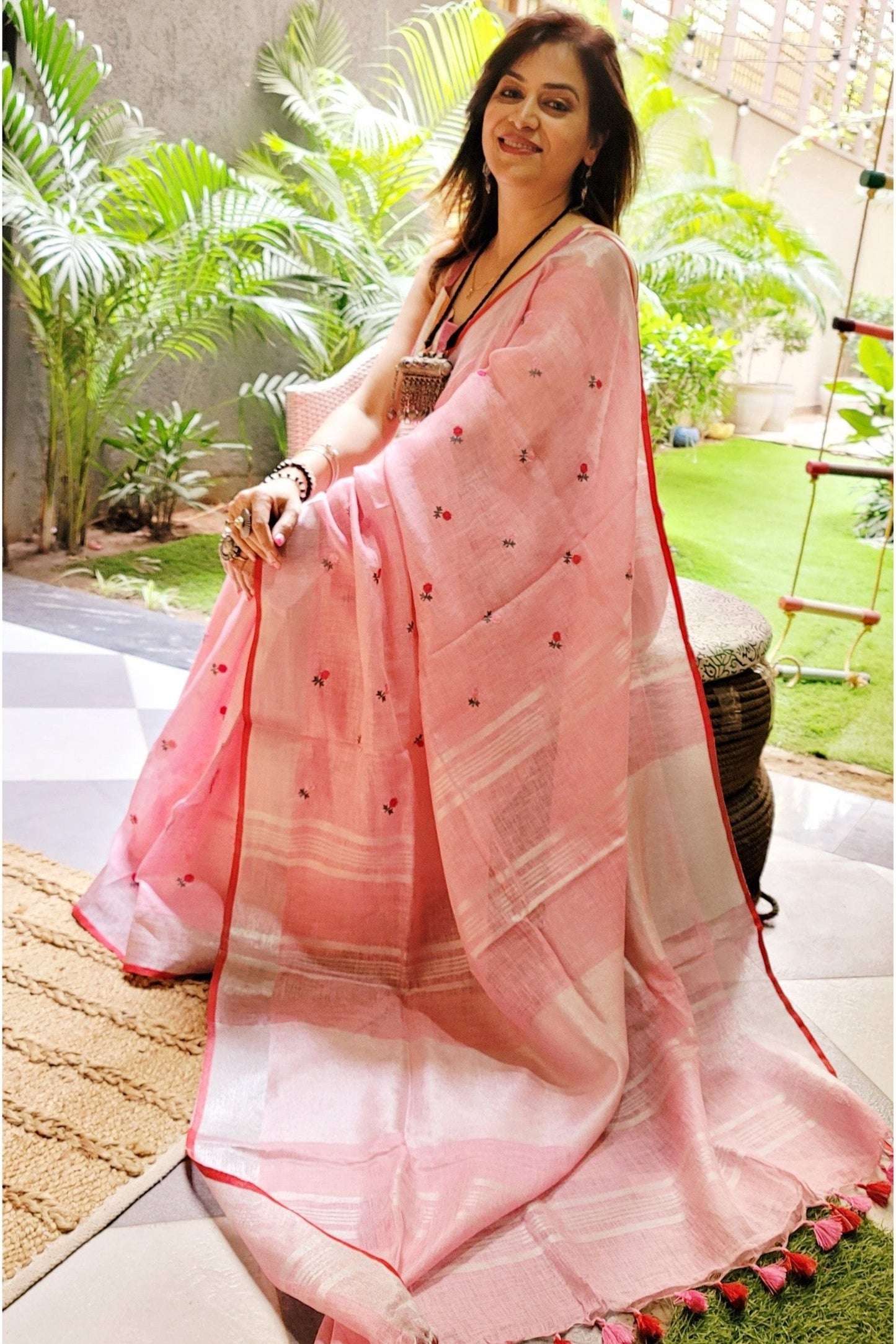 True Peach Pure Linen Embroidered Saree with Tassels Detailing